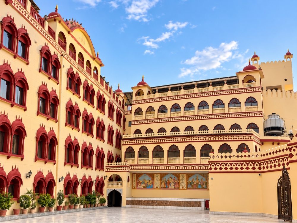 Hotel courtyard and heritage facade in daylight at Fort Chandragupt Hotel Jaipur